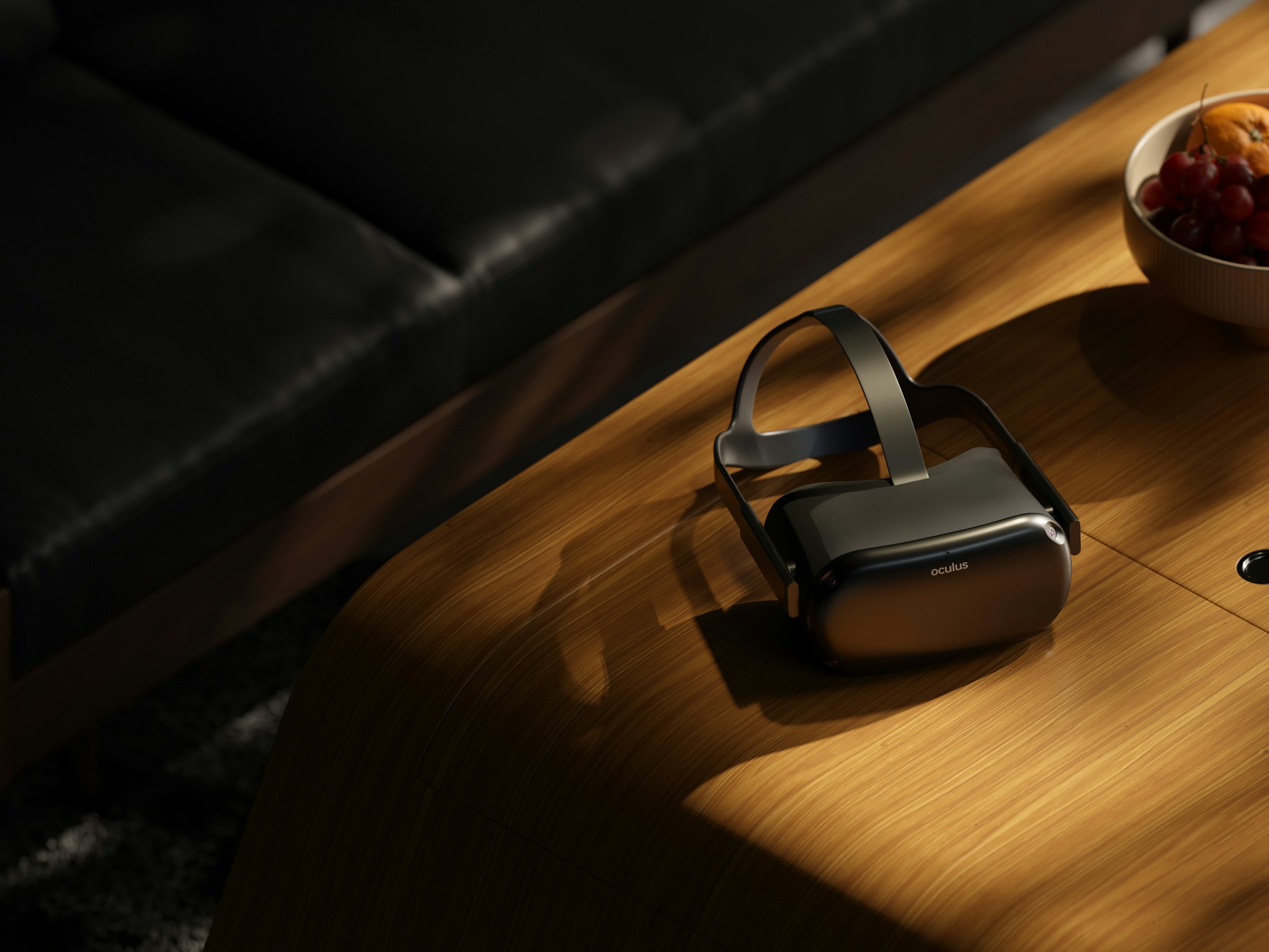 Oculus headset on a wooden table in warm light